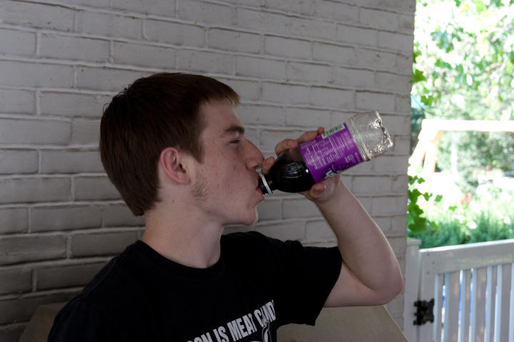 The birthday boy loves his grape drink