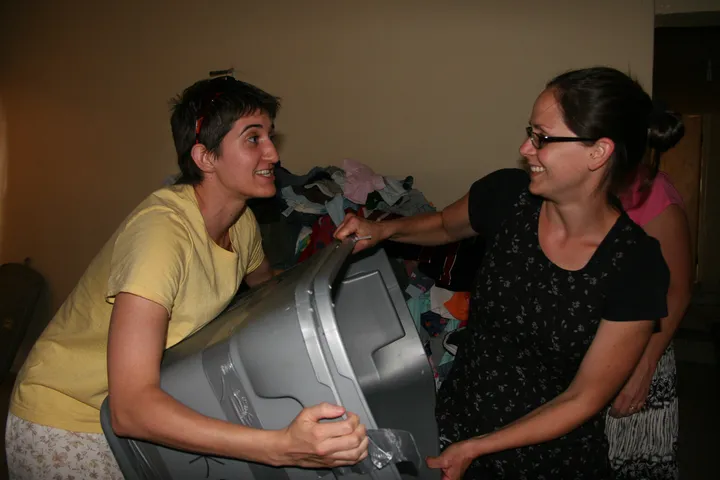 Jen and Alyson taking bins apart
