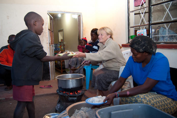 Gaye helping out with serving dinner