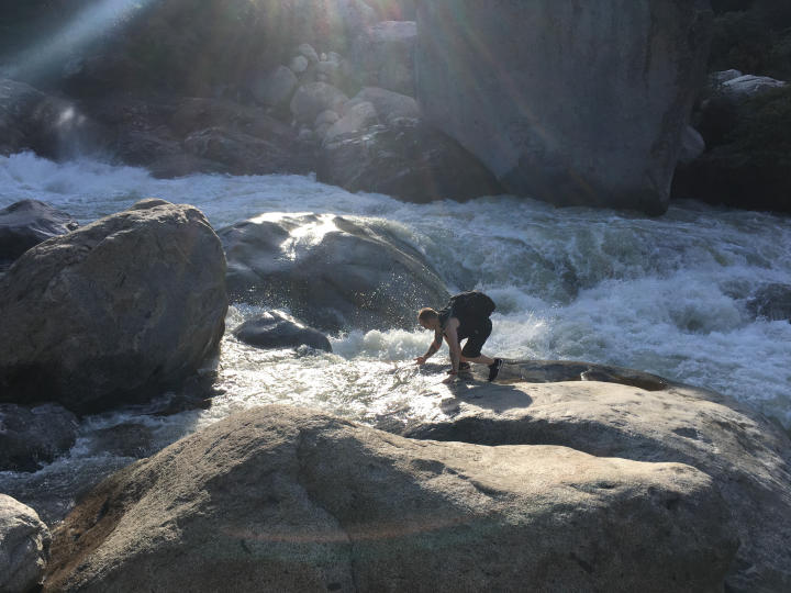 Scott checking water temperature