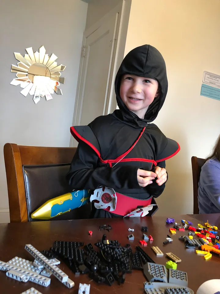 Ninja assembling some Legos