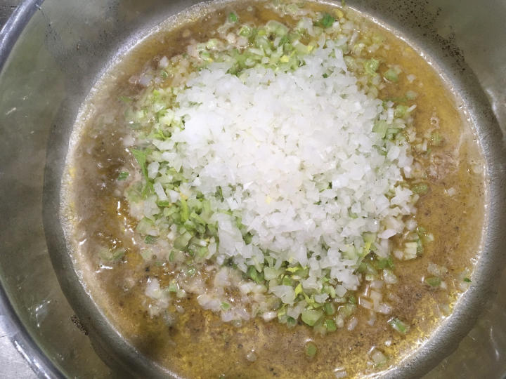 Photo of onions and celery in melted butter