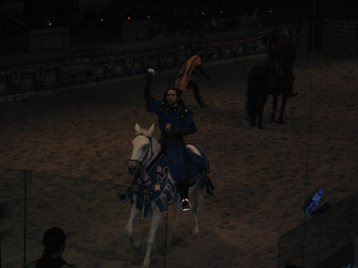 Blue Knight passing out a flower