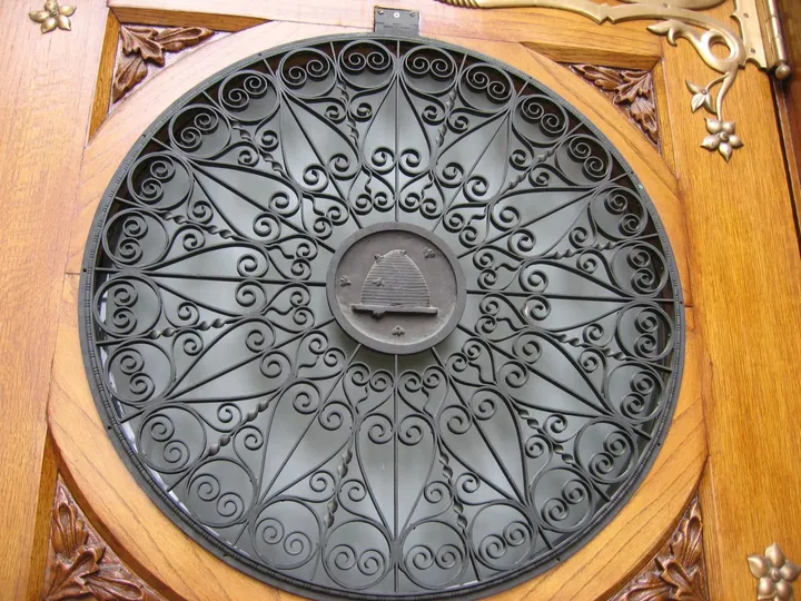 The decoration on the upper part of the door