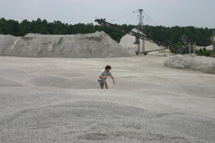 JT hiking up the gravel