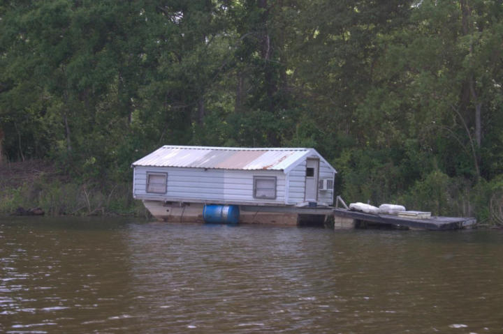 A lonely houseboat on the bayou